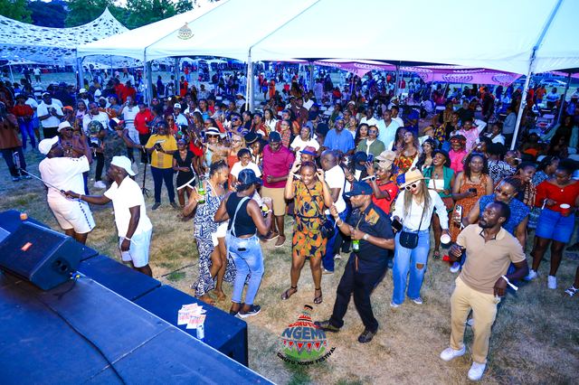 Festival crowd under the tents at Gikuyu Ngemi